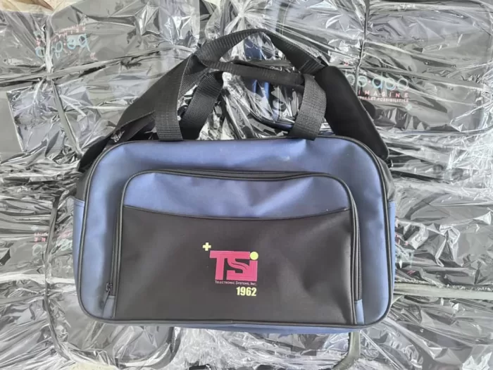 blue duffle bag with print 1